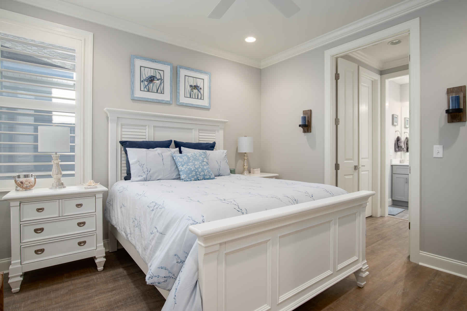 22 Roundwood Drive, Unit LOT 294 Watersound, FL 32461 - Photo 23 of 32 a bedroom with a bed and a window