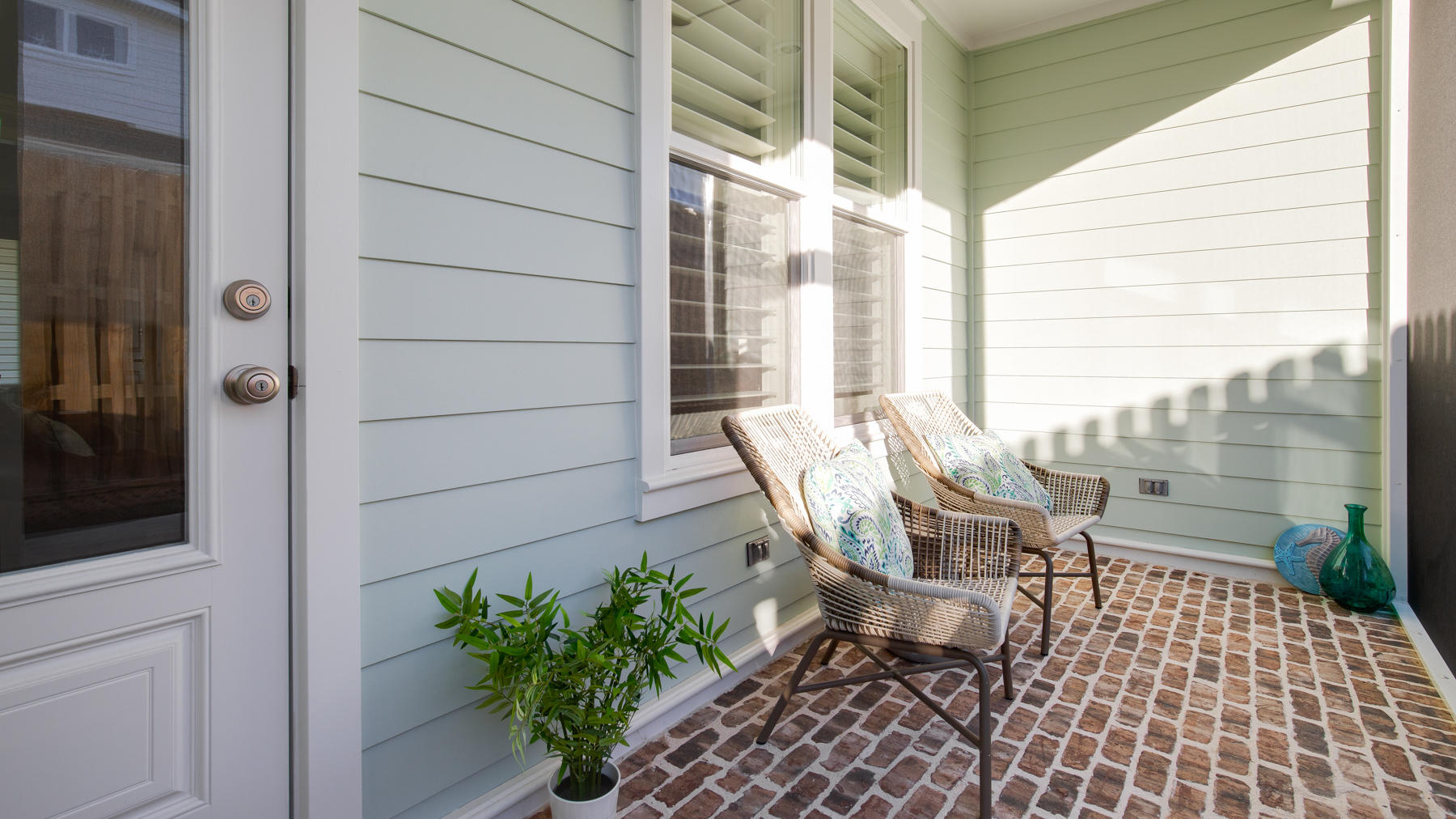 22 Roundwood Drive, Unit LOT 294 Watersound, FL 32461 - Photo 4 of 32 a roof deck with table and chairs and potted plants