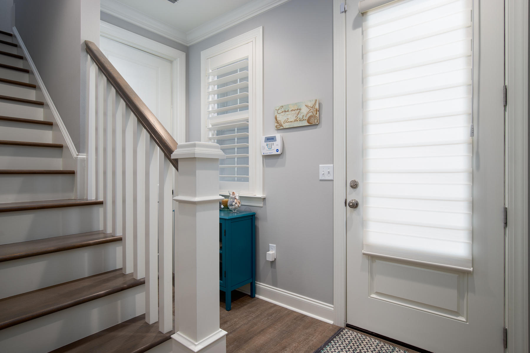 22 Roundwood Drive, Unit LOT 294 Watersound, FL 32461 - Photo 5 of 32 a view of staircase with white walls and white door