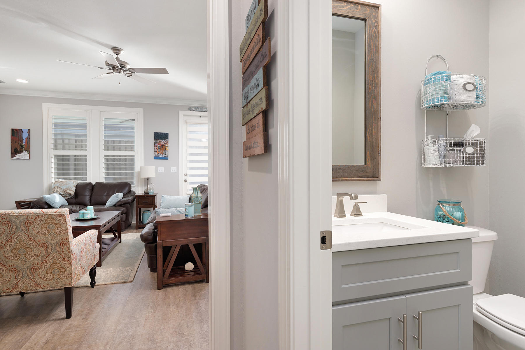 22 Roundwood Drive, Unit LOT 294 Watersound, FL 32461 - Photo 6 of 32 a en suite bathroom with a toilet a sink and a mirror