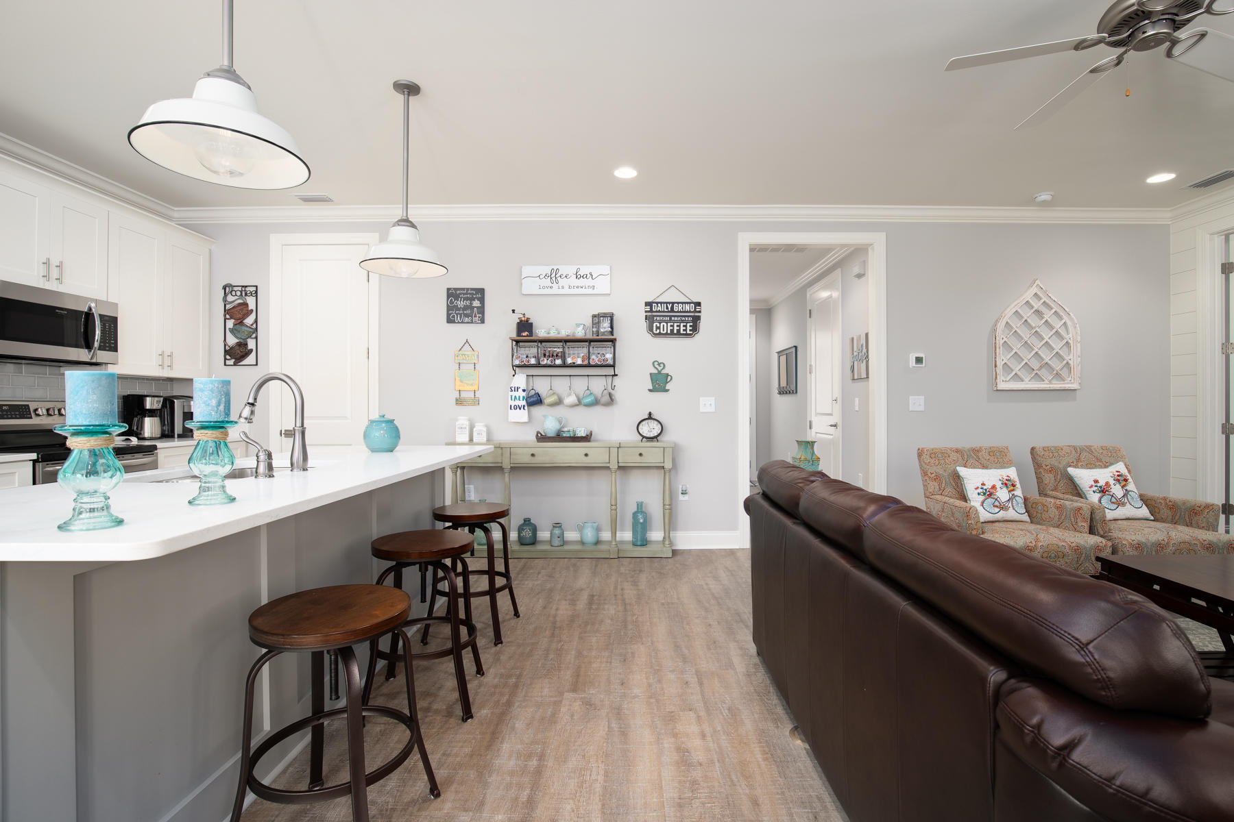 22 Roundwood Drive, Unit LOT 294 Watersound, FL 32461 - Photo 10 of 32 a kitchen with stainless steel appliances kitchen island granite countertop a sink and cabinets