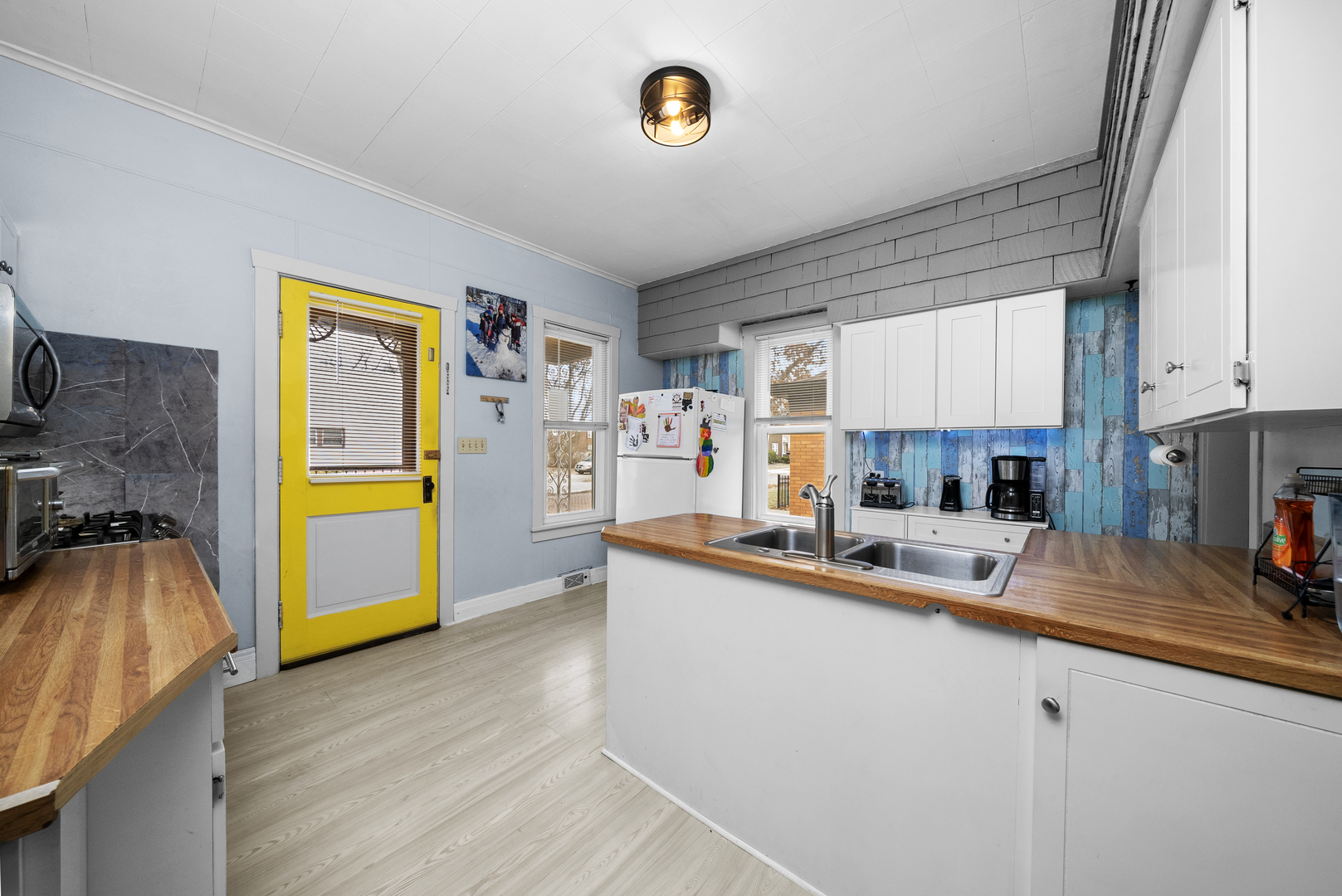 516 Catherine Street Ottawa, IL 61350 - Photo 14 of 38 a kitchen with a sink appliances cabinets and a counter top space