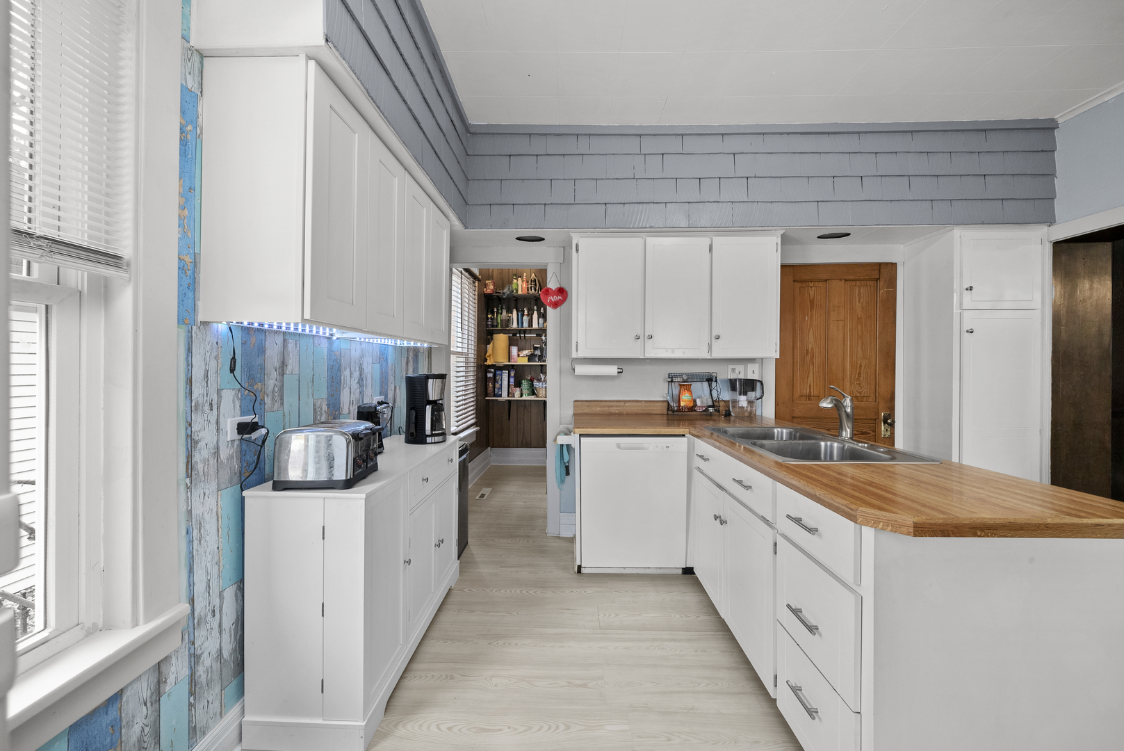 516 Catherine Street Ottawa, IL 61350 - Photo 16 of 38 a kitchen with a sink and cabinets