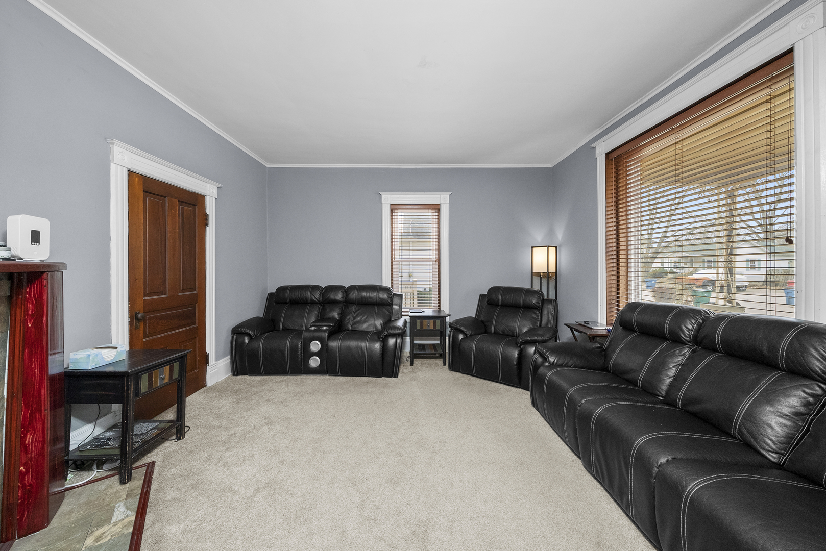 516 Catherine Street Ottawa, IL 61350 - Photo 17 of 38 a living room with furniture a window and a flat screen tv