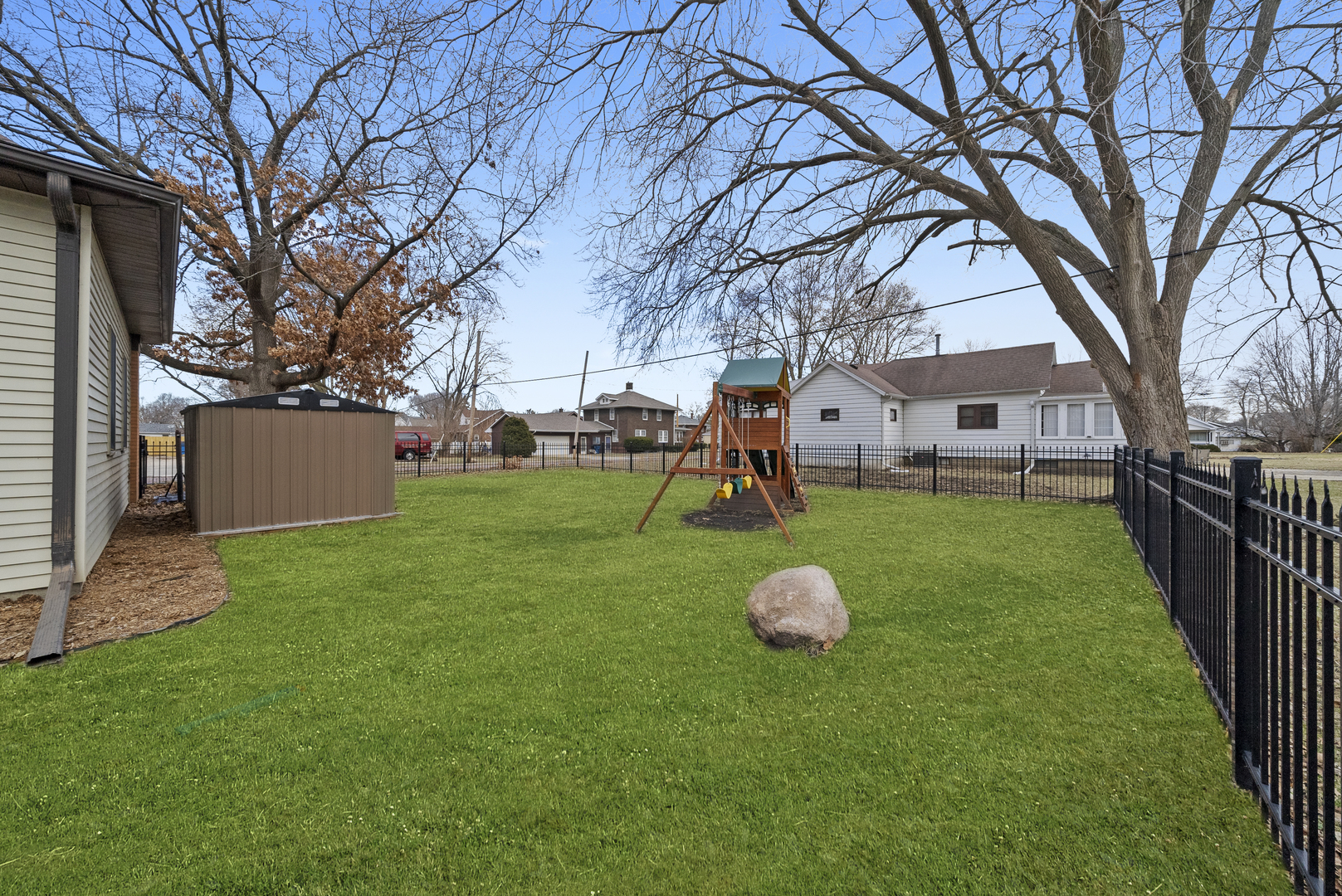 516 Catherine Street Ottawa, IL 61350 - Photo 7 of 38 a view of a backyard with a tree