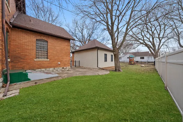 a view of a backyard with a garden