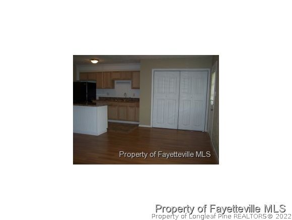 6486 Green Meadow Road Fayetteville, NC 28304 - Photo 4 of 10 a bathroom with a sink and a mirror