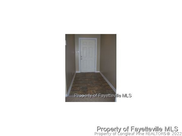 6486 Green Meadow Road Fayetteville, NC 28304 - Photo 7 of 10 a picture of door of the background