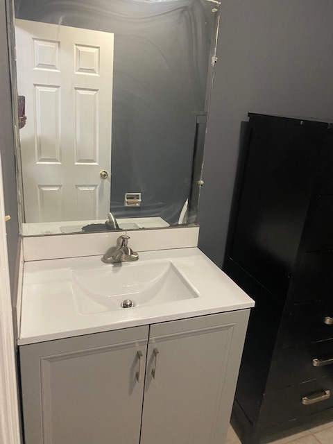 143 West Elk Trail, Unit 342 Carol Stream, IL 60188 - Photo 13 of 13 a close view of a sink and dishwasher with wooden cabinet