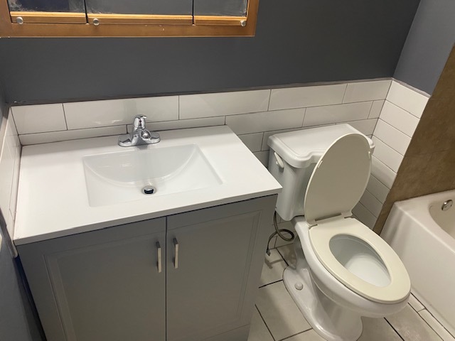 143 West Elk Trail, Unit 342 Carol Stream, IL 60188 - Photo 8 of 13 a close view of a sink and a washer and dryer