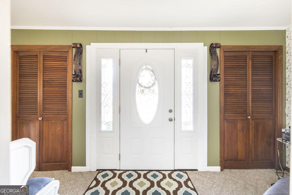 751 Findley Road Pinehurst, GA 31070 - Photo 11 of 47 a front view of a house with entryway