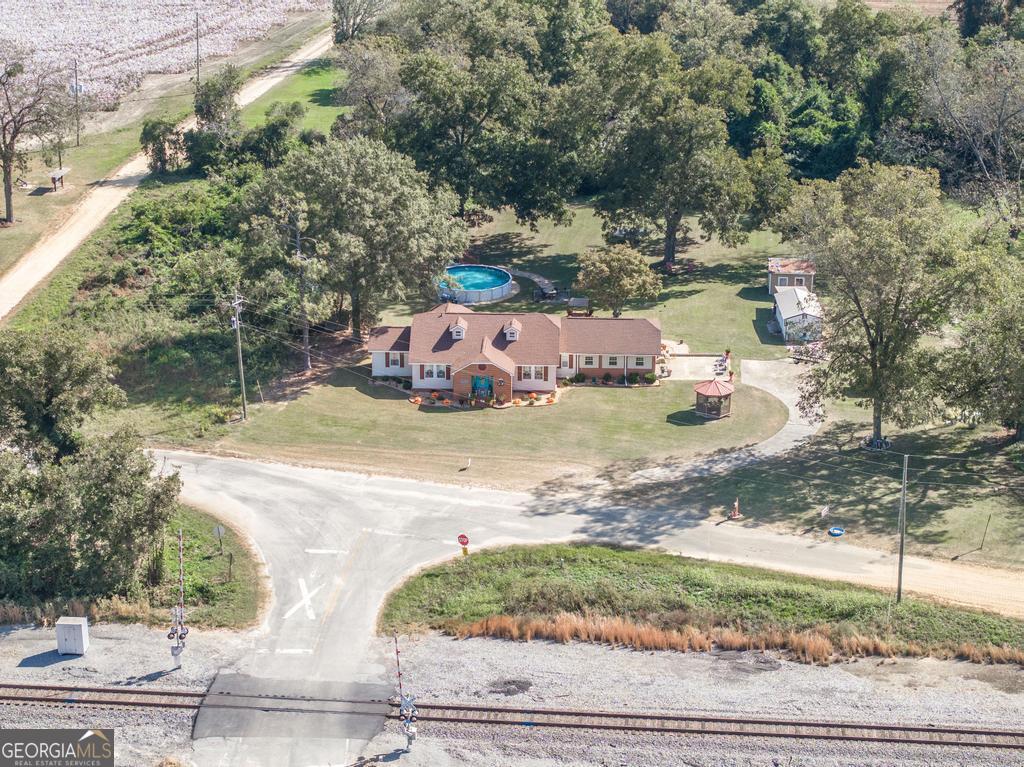 751 Findley Road Pinehurst, GA 31070 - Photo 4 of 47 a view of a backyard of a house