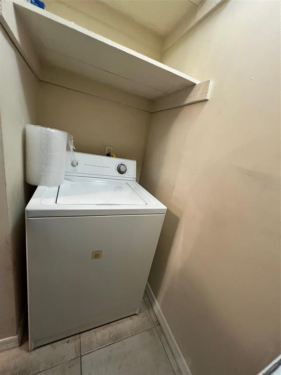 455 Alt 19, Unit 159 Palm Harbor, FL 34683 - Photo 12 of 26 a utility room with dryer and washer
