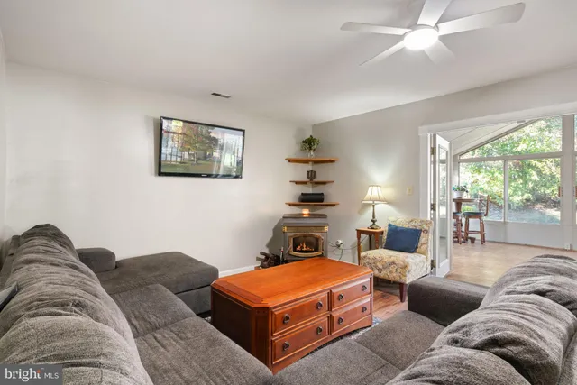 a living room with furniture and a couch