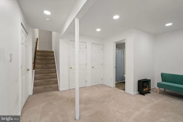 a view of a livingroom with staircase