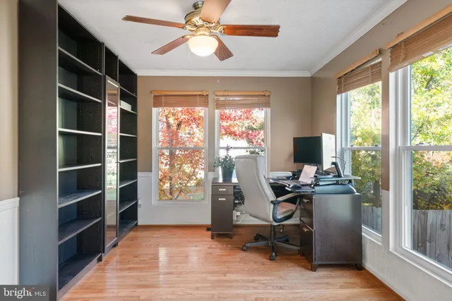 a view of entryway with wooden floor