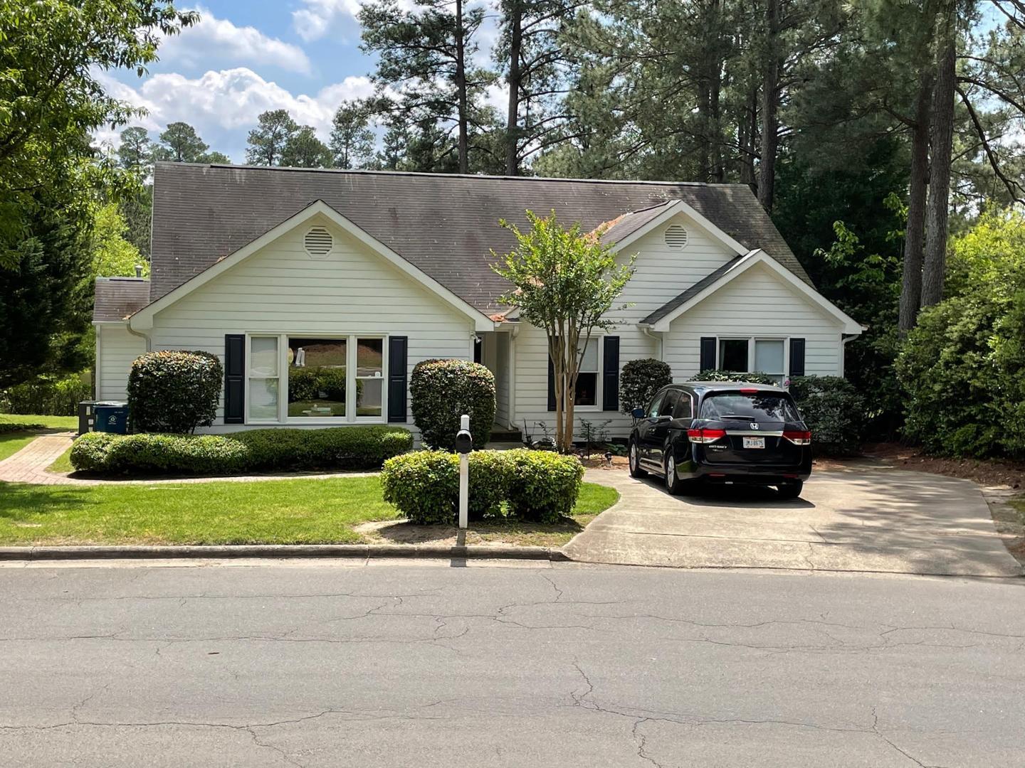 a view of house and yard