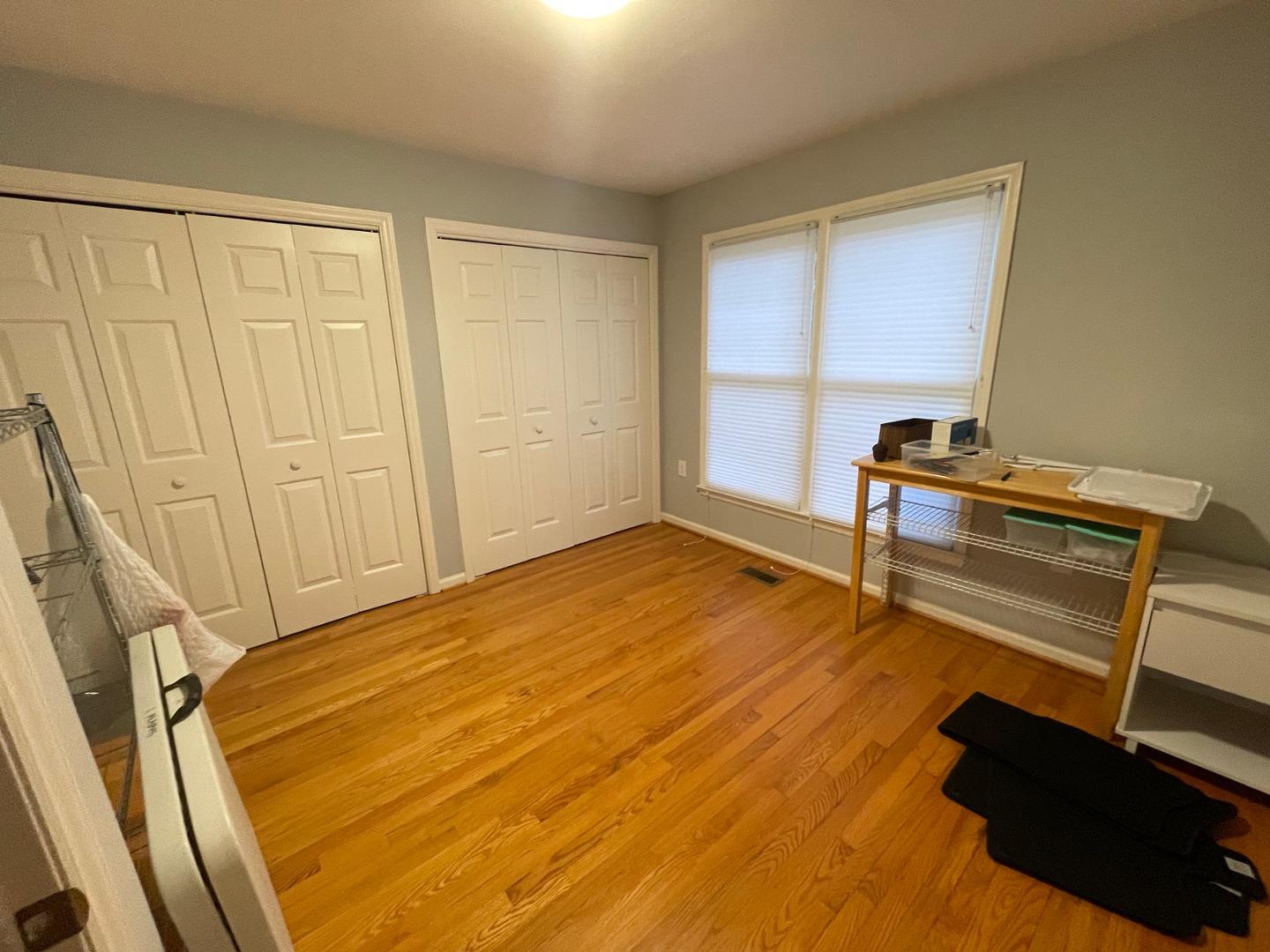 96 Lakeshore Drive Durham, NC 27713 - Photo 18 of 21 a room with wooden floor and furniture