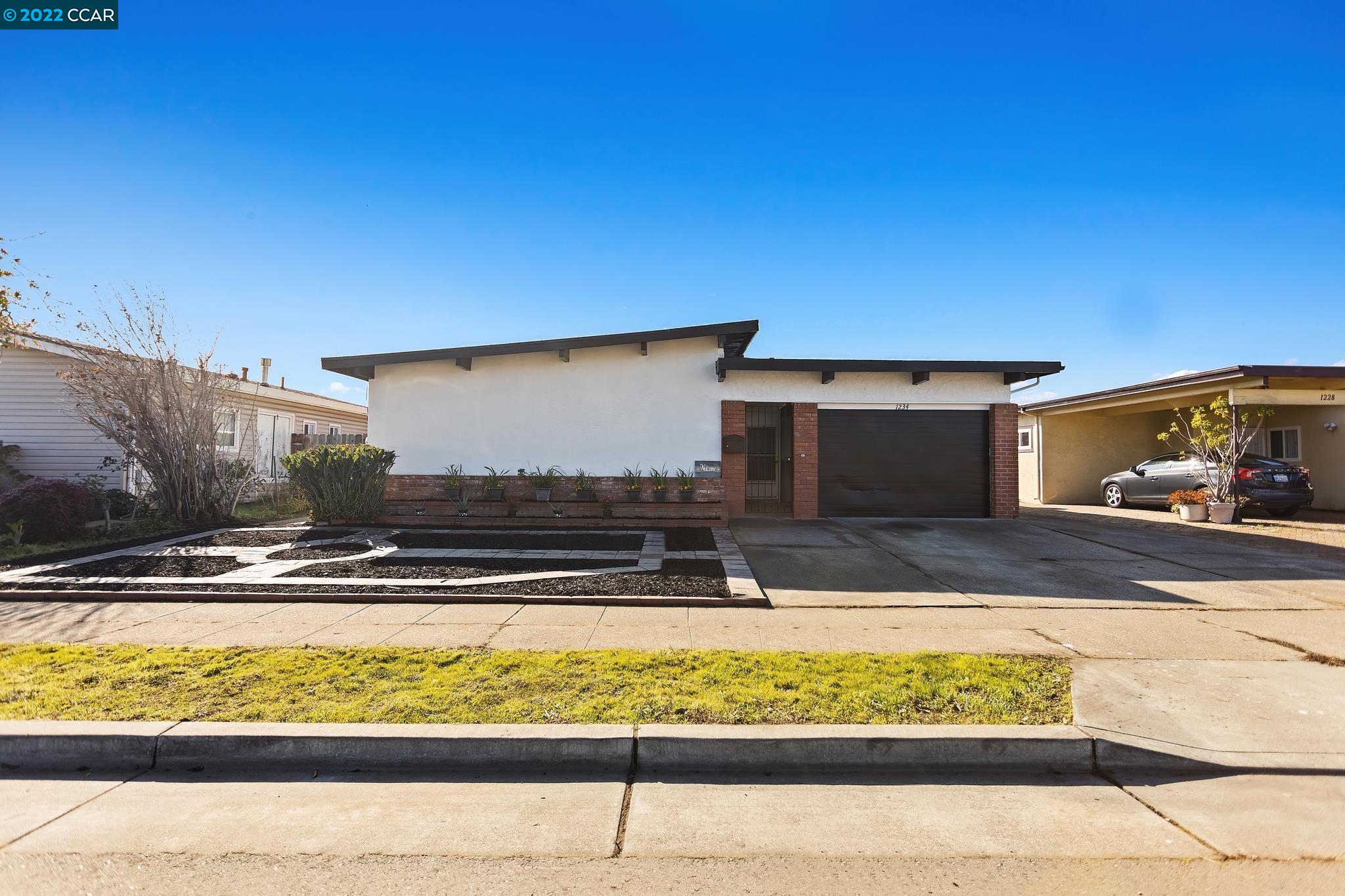 1234 Otis Drive Alameda, CA 94501 - Photo 1 of 1 a view of a house with a yard