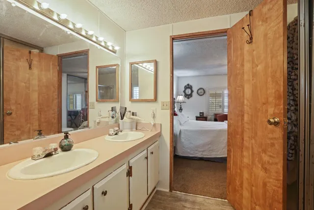 a view of storage and utility room with washer and dryer