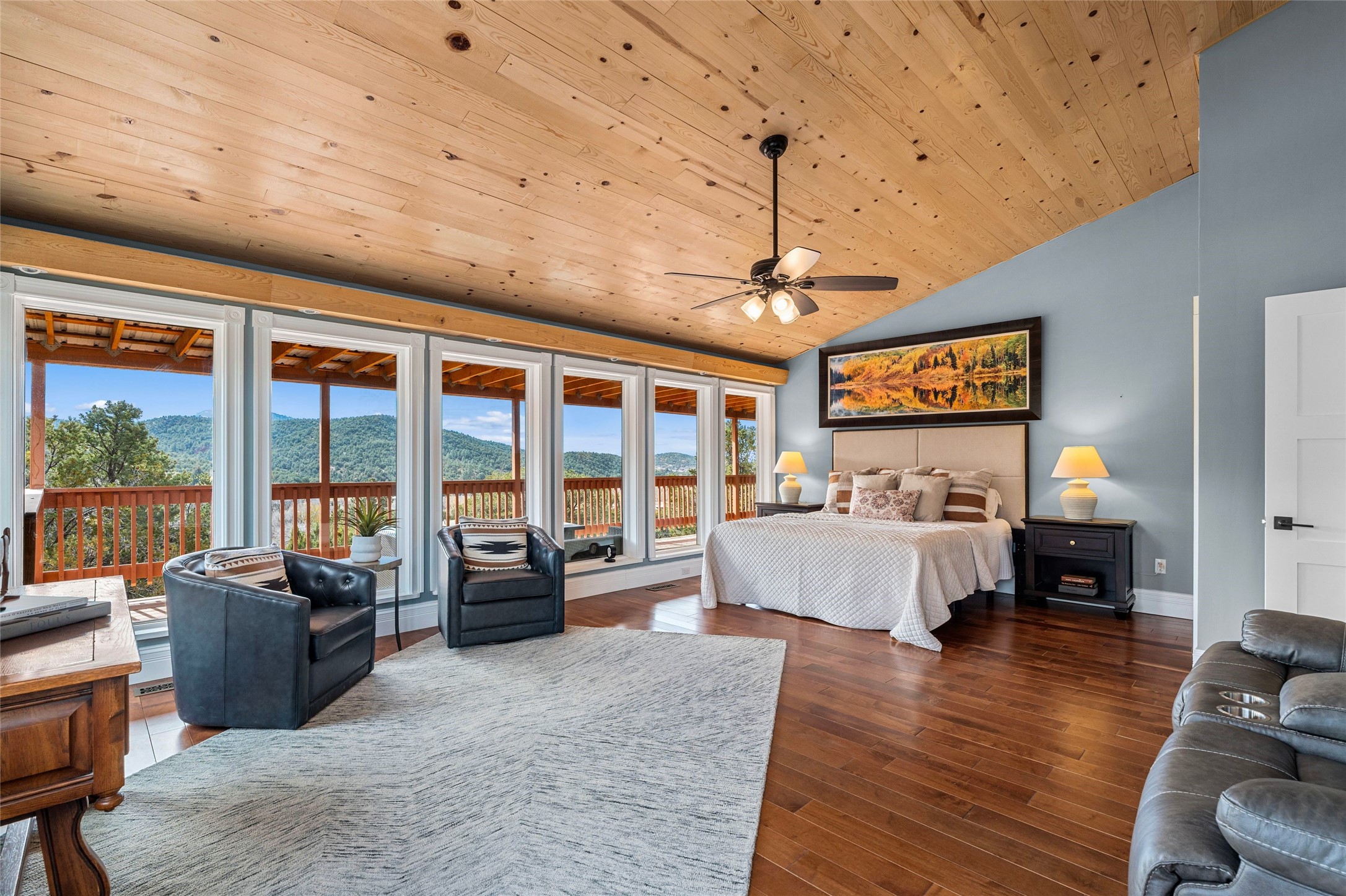 1661 Cerro Gordo Road, Unit E Santa Fe, NM 87501 - Photo 12 of 50 Primary bedroom with views of Picacho Peak and Santa Fe River Valley