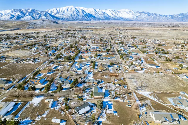 a balcony view with a flat screen tv
