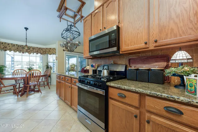 a bedroom with a bed and flat screen tv