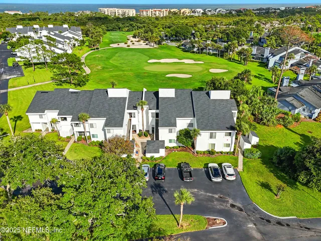 a view of a house with a garden