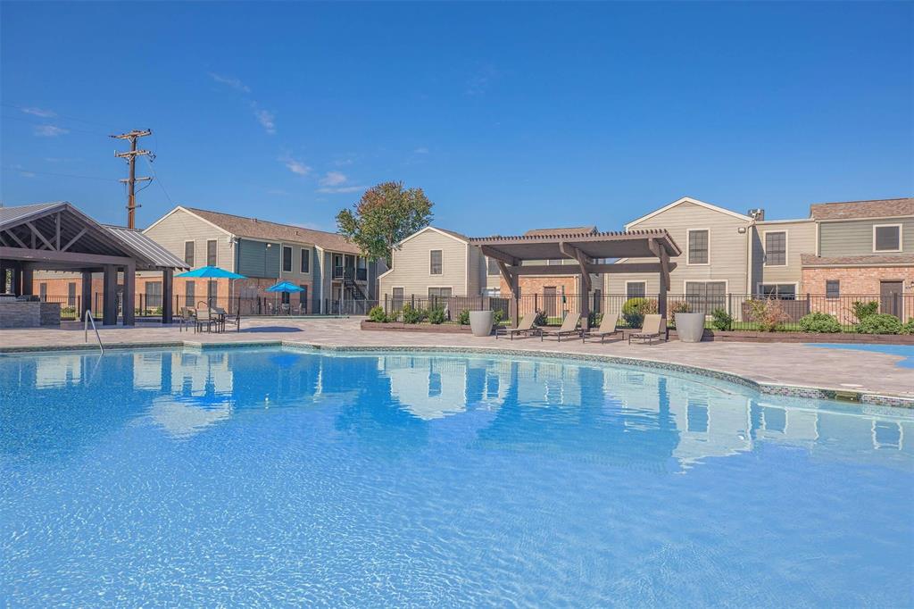 3125 Crestdale Drive, Unit 2022 Houston, TX 77080 - Photo 1 of 43 a front view of a house with swimming pool