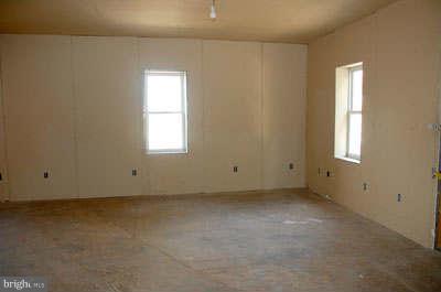 2518 Sparrows Point Road Sparrows Point, MD 21219 - Photo 11 of 19 an empty room with a window