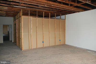 2518 Sparrows Point Road Sparrows Point, MD 21219 - Photo 18 of 19 a view of empty room with wooden floor
