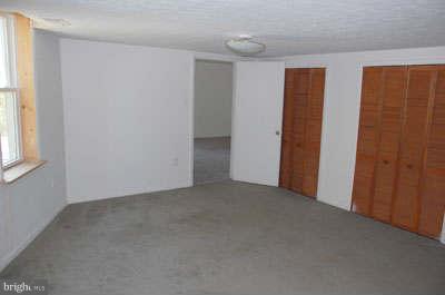 2518 Sparrows Point Road Sparrows Point, MD 21219 - Photo 7 of 19 an empty room with windows