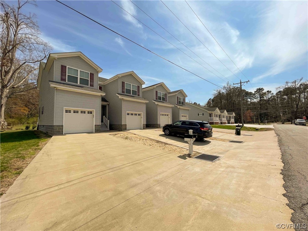 102-112 Maple Street Kenbridge, VA 23944 - Photo 4 of 11 a swimming pool with outdoor seating and yard