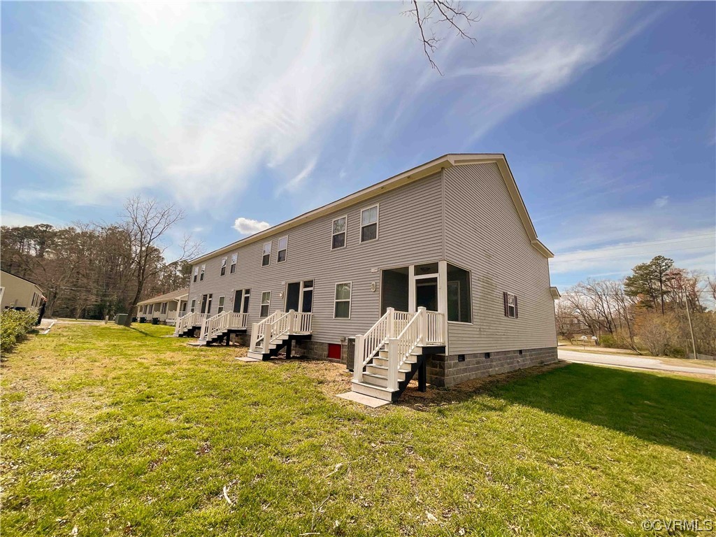 102-112 Maple Street Kenbridge, VA 23944 - Photo 6 of 11 a view of a house with a yard