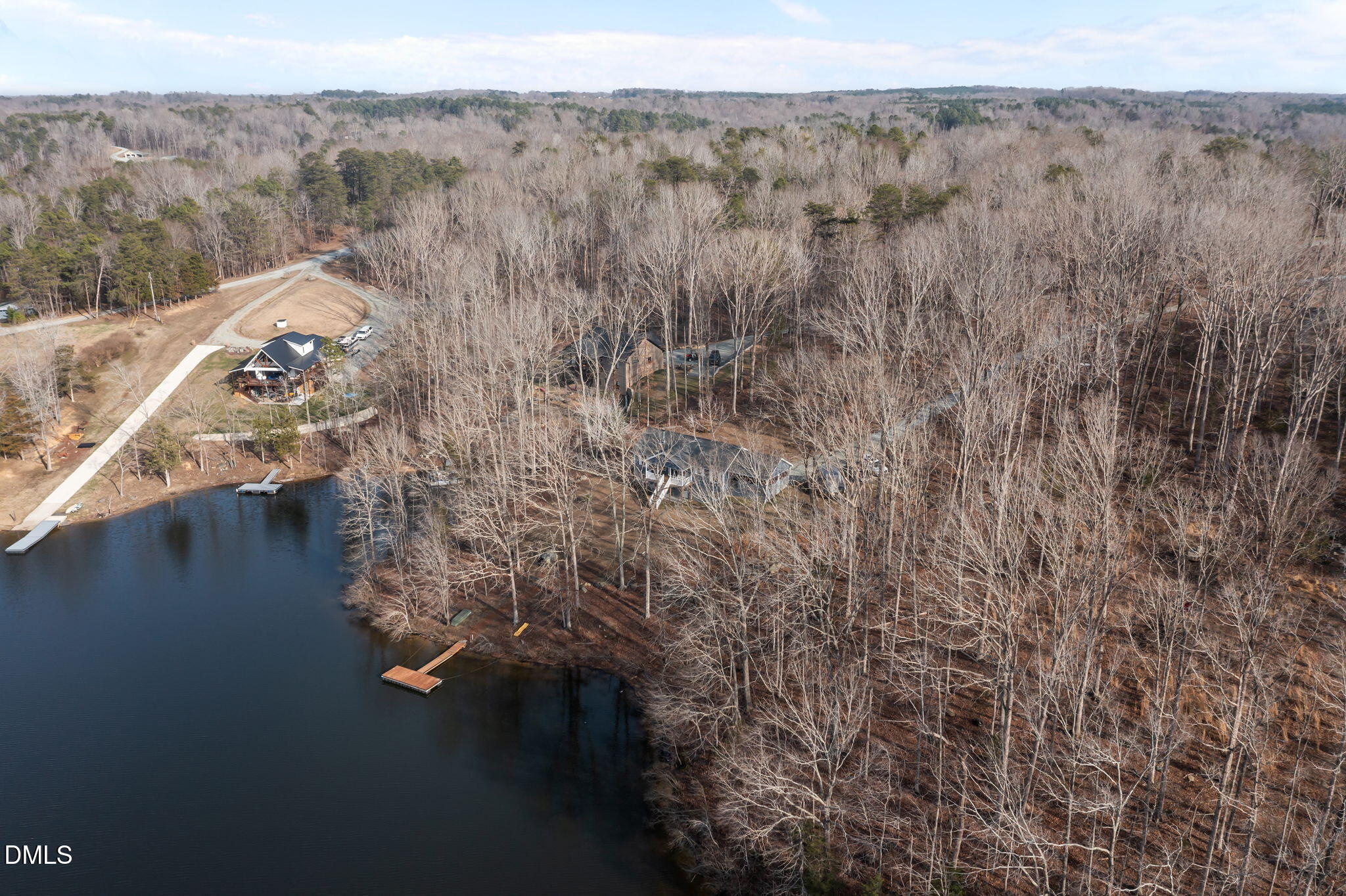 58 Lakefront Road Prospect Hill, NC 27314 - Photo 11 of 45 a view of a houses with a yard
