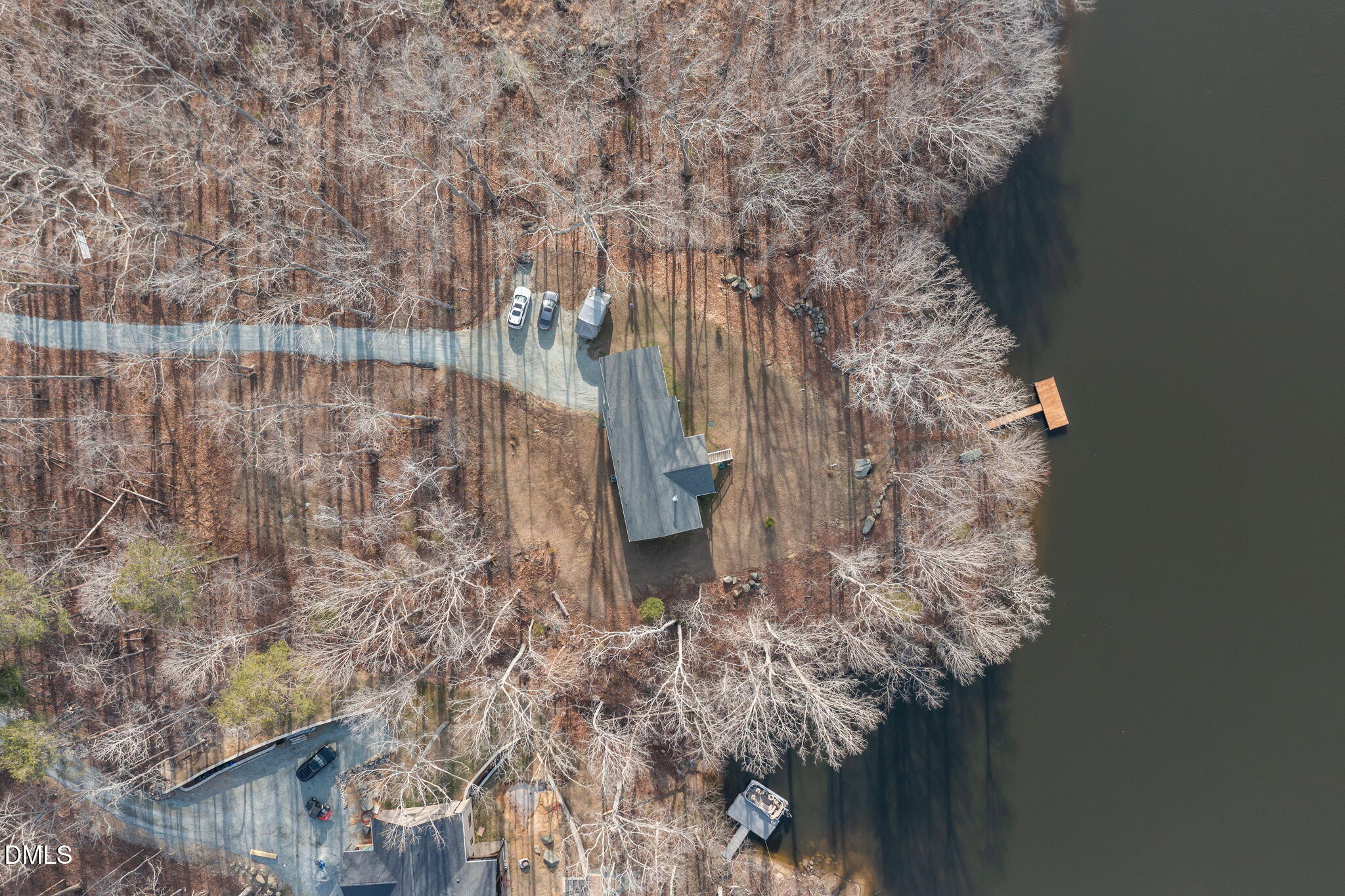 58 Lakefront Road Prospect Hill, NC 27314 - Photo 15 of 45 a aerial view of a house with a yard
