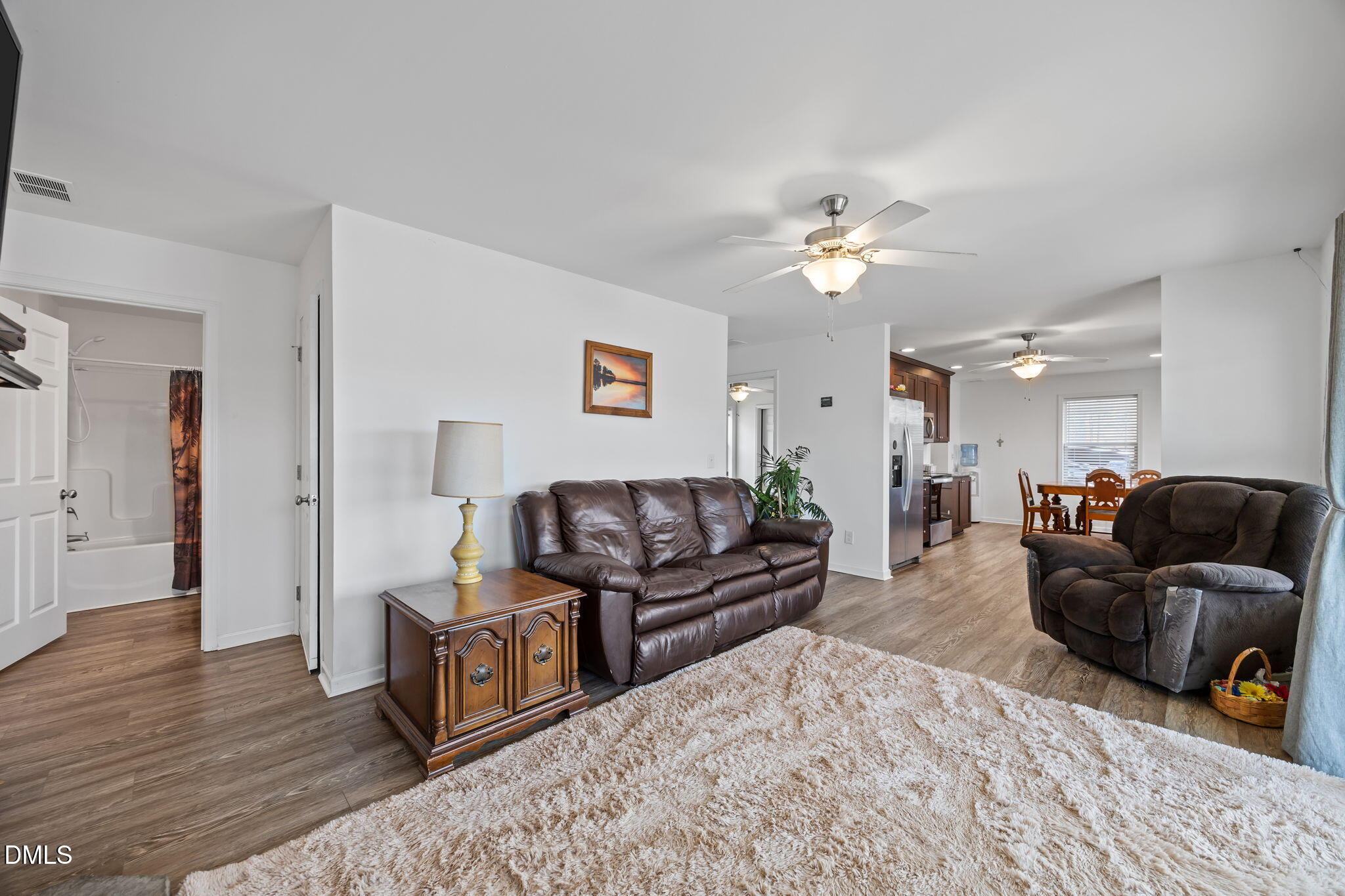 58 Lakefront Road Prospect Hill, NC 27314 - Photo 29 of 45 a living room with furniture and wooden floor