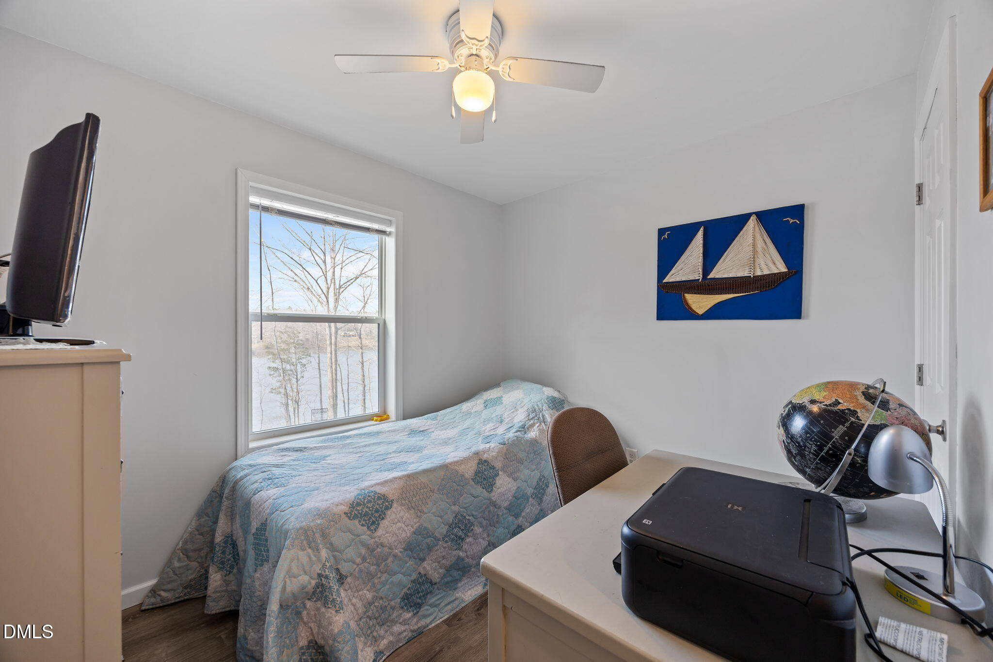 58 Lakefront Road Prospect Hill, NC 27314 - Photo 32 of 45 a bedroom with a bed and a window