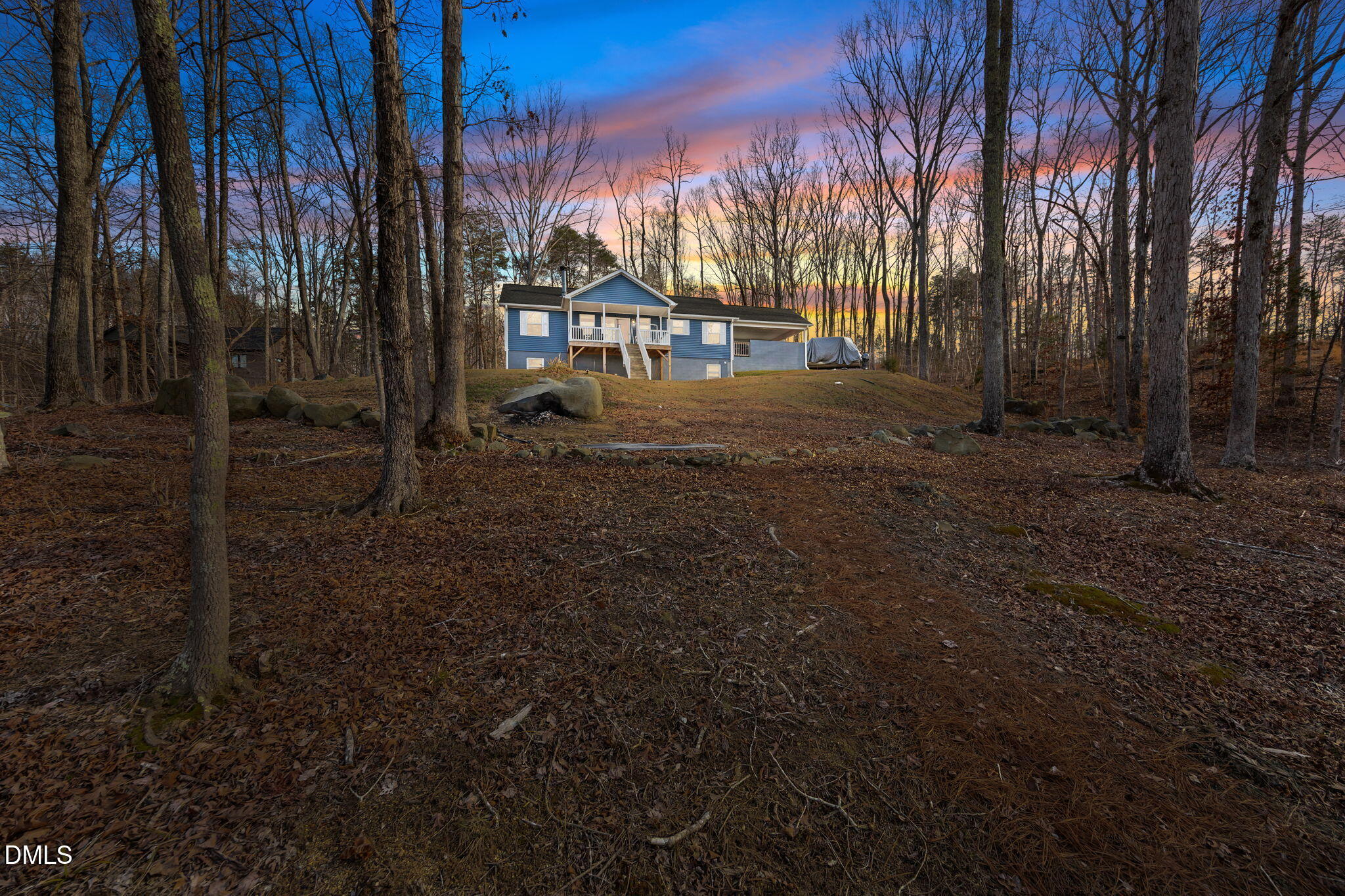 58 Lakefront Road Prospect Hill, NC 27314 - Photo 5 of 45 a view of street with trees in the background