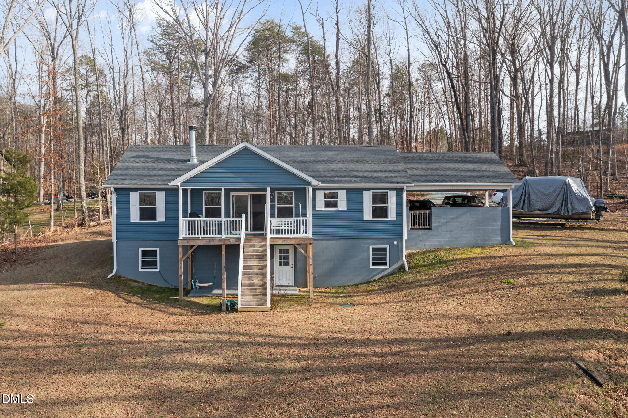 58 Lakefront Road Prospect Hill, NC 27314 - Photo 7 of 45 a front view of a house with a garden