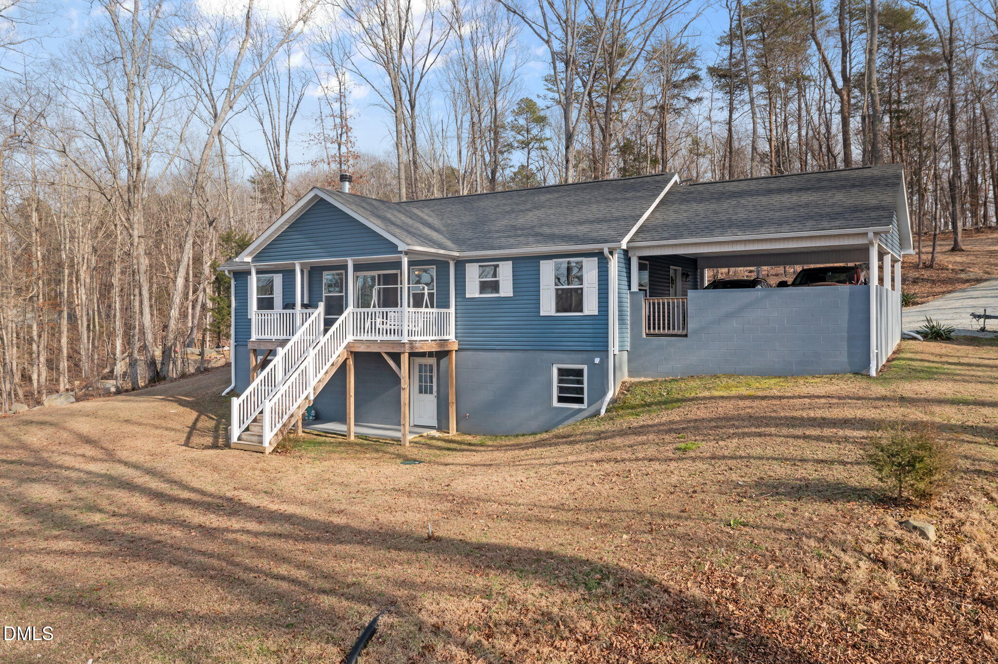 58 Lakefront Road Prospect Hill, NC 27314 - Photo 8 of 45 a view of a house with backyard porch and roof