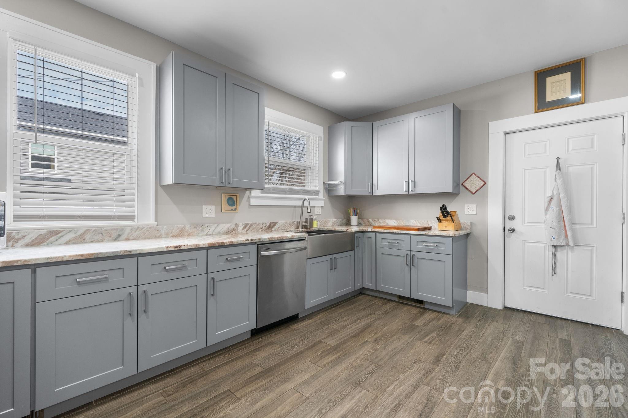 115 12th Street Southwest Hickory, NC 28602 - Photo 13 of 35 a kitchen with sink and cabinets