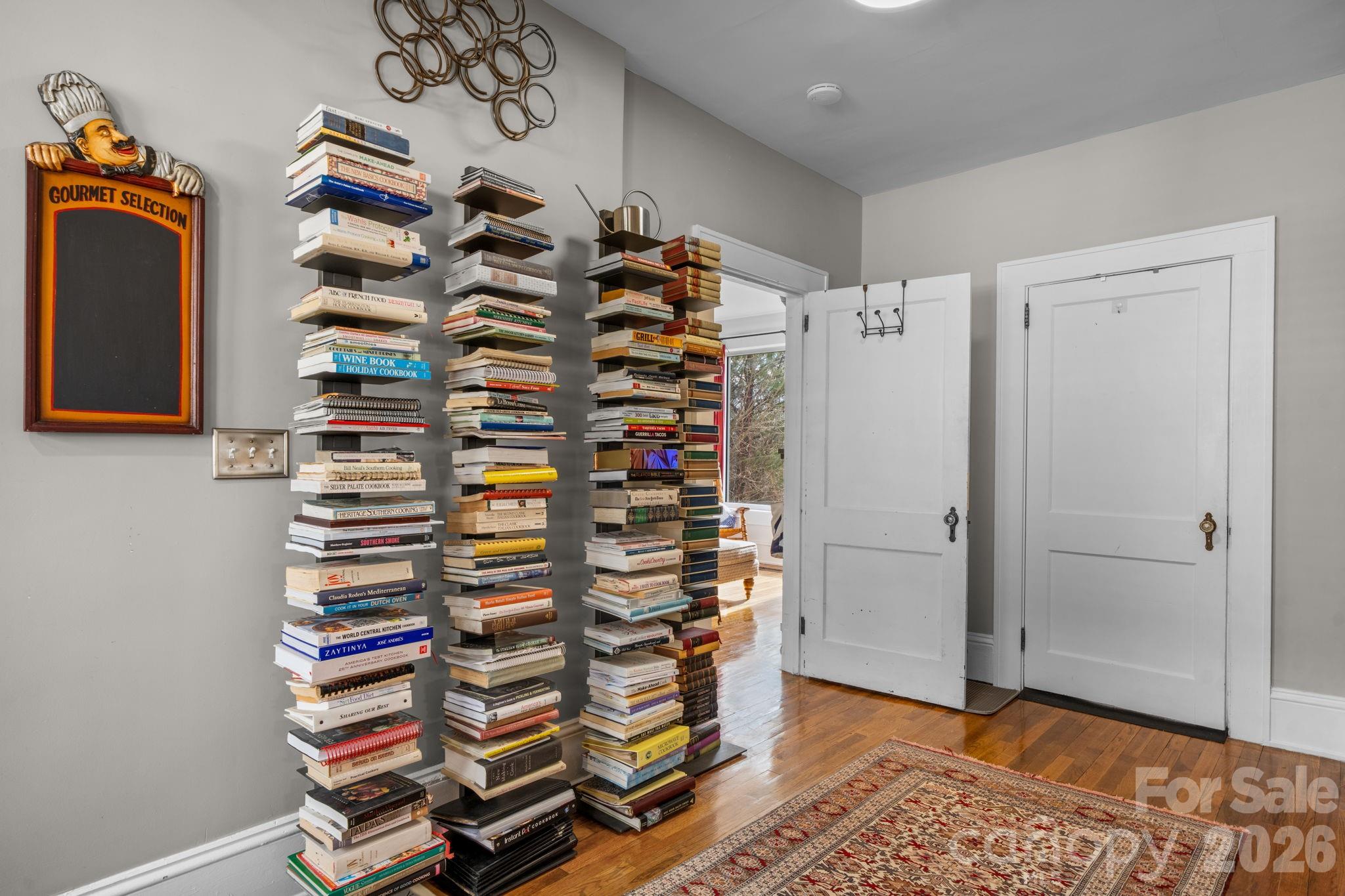 115 12th Street Southwest Hickory, NC 28602 - Photo 17 of 35 a view of walk in closet with clothes and shoes