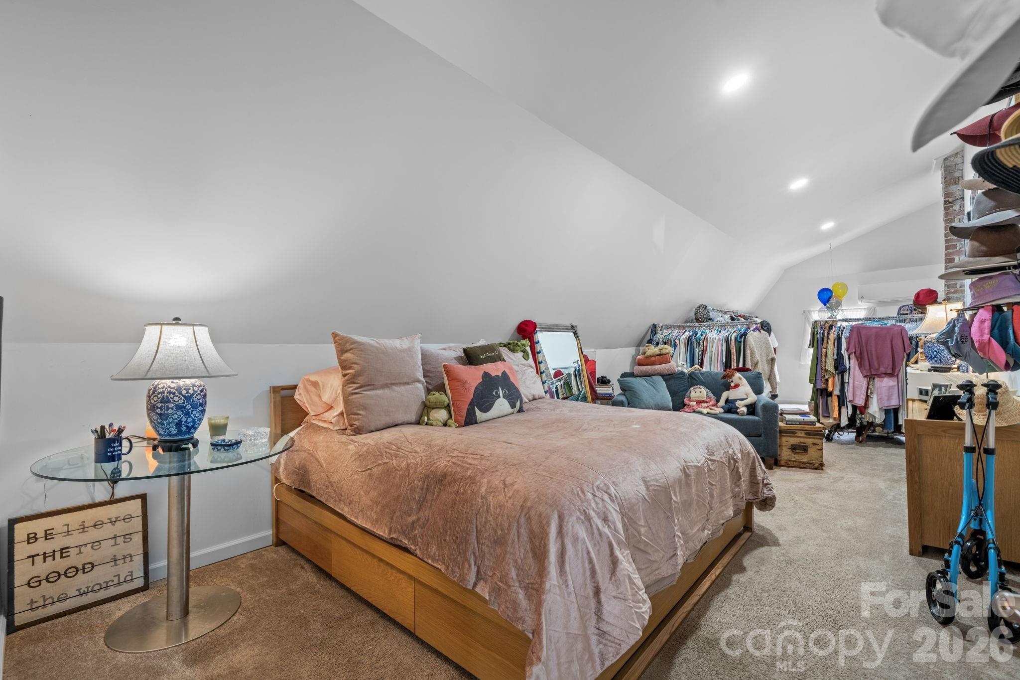 115 12th Street Southwest Hickory, NC 28602 - Photo 24 of 35 a bed room with a bed and a desk