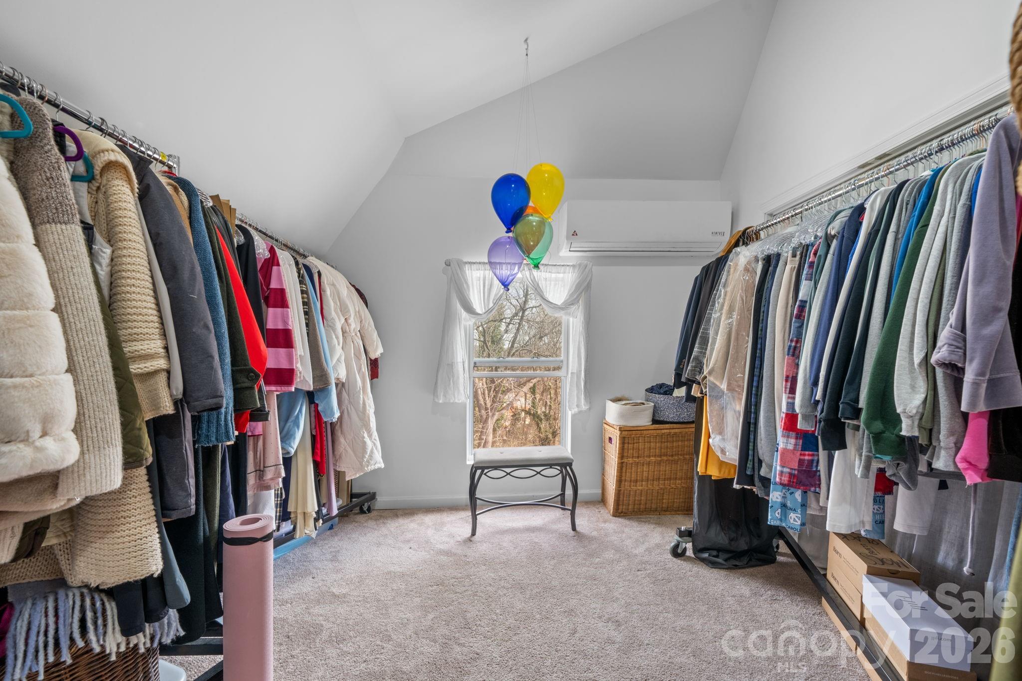 115 12th Street Southwest Hickory, NC 28602 - Photo 25 of 35 a view of walk in closet with clothes and shoes