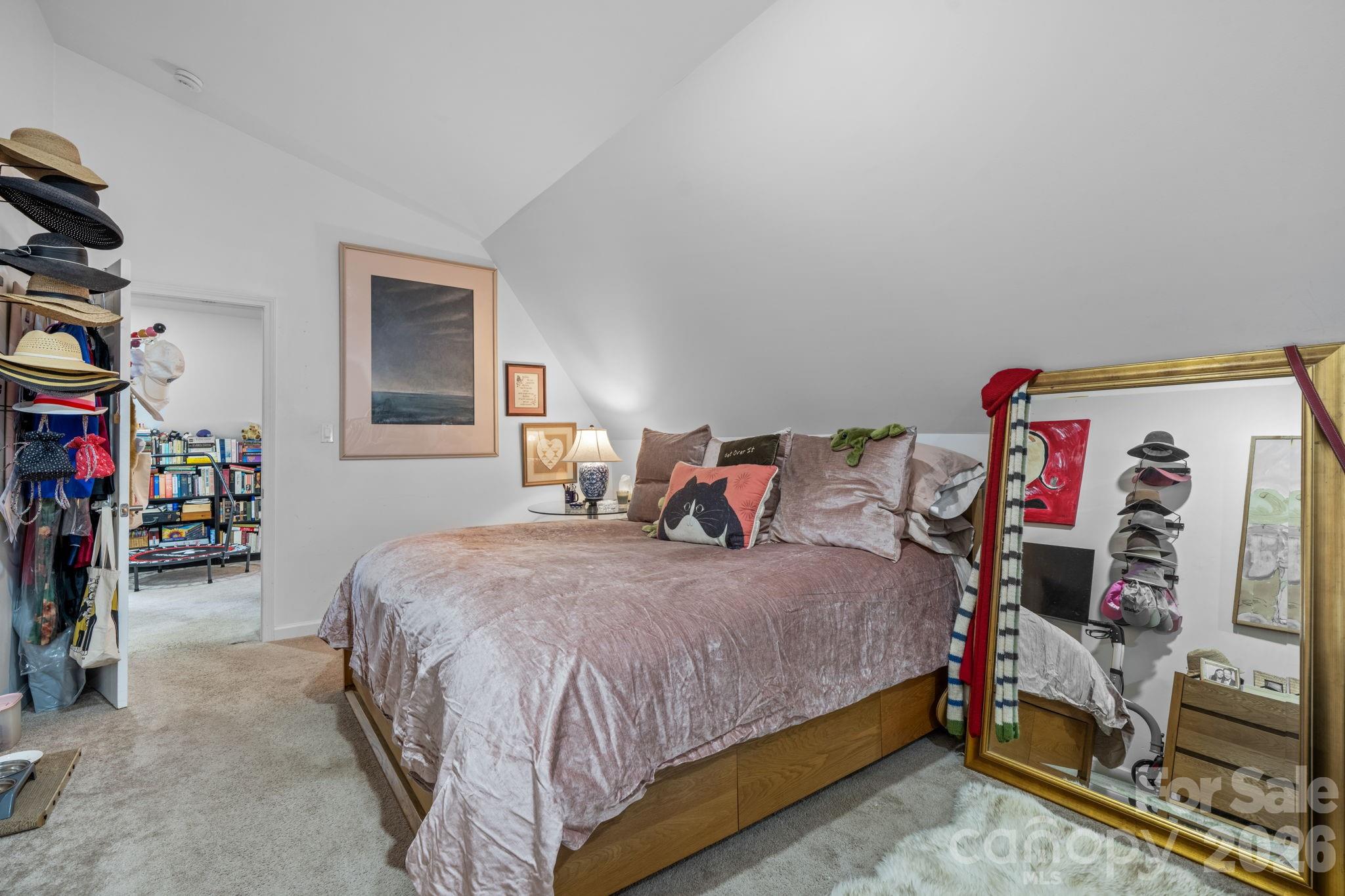 115 12th Street Southwest Hickory, NC 28602 - Photo 26 of 35 a bedroom with a bed and a tv