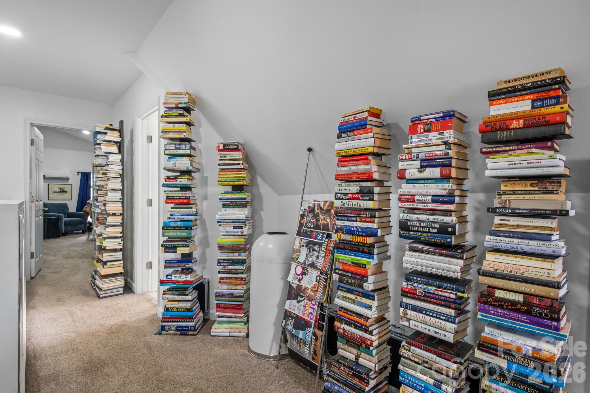 115 12th Street Southwest Hickory, NC 28602 - Photo 27 of 35 a view of walk in closet with clothes and shoes