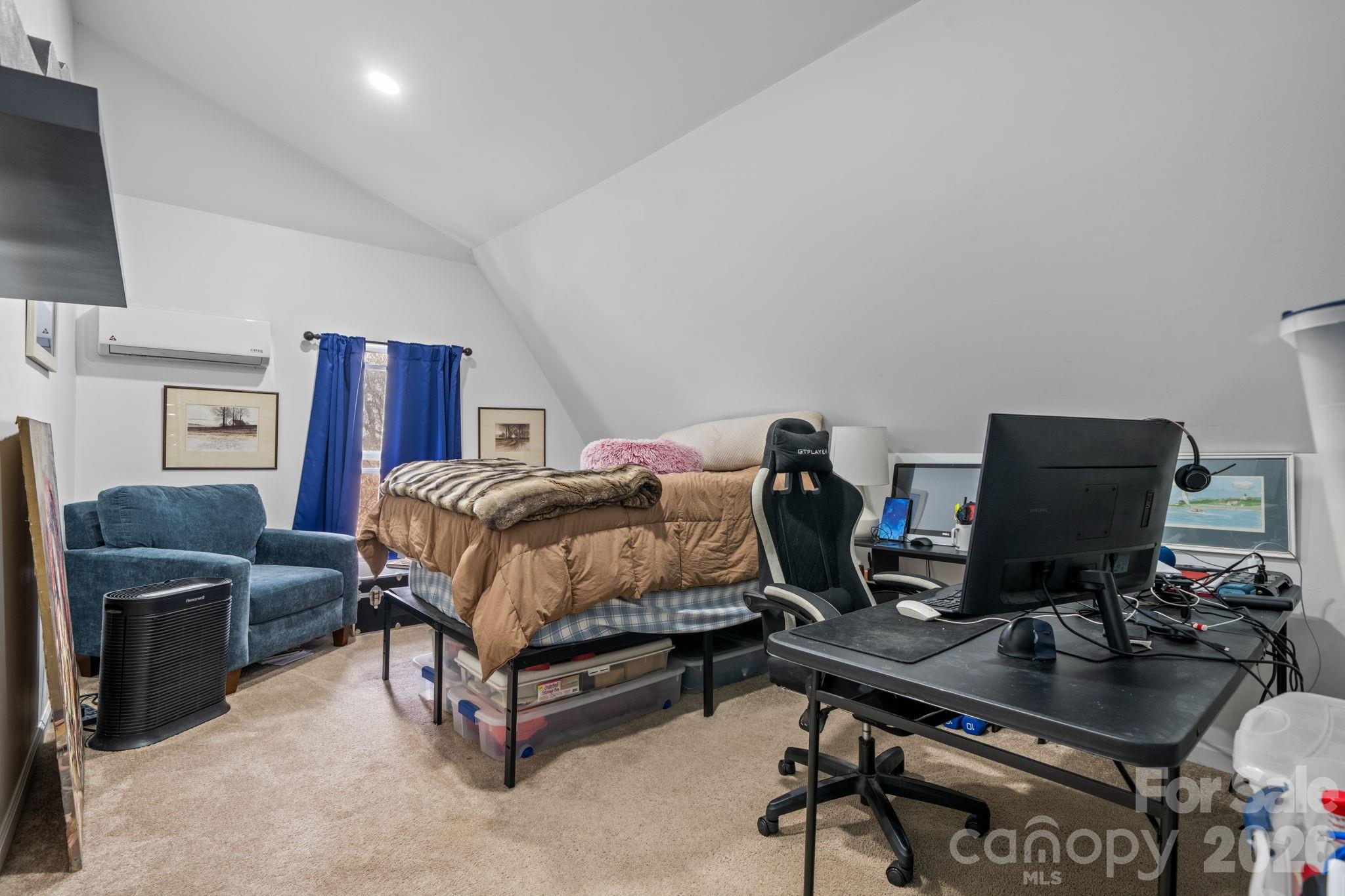115 12th Street Southwest Hickory, NC 28602 - Photo 28 of 35 a bedroom with bed and a computer on the desk