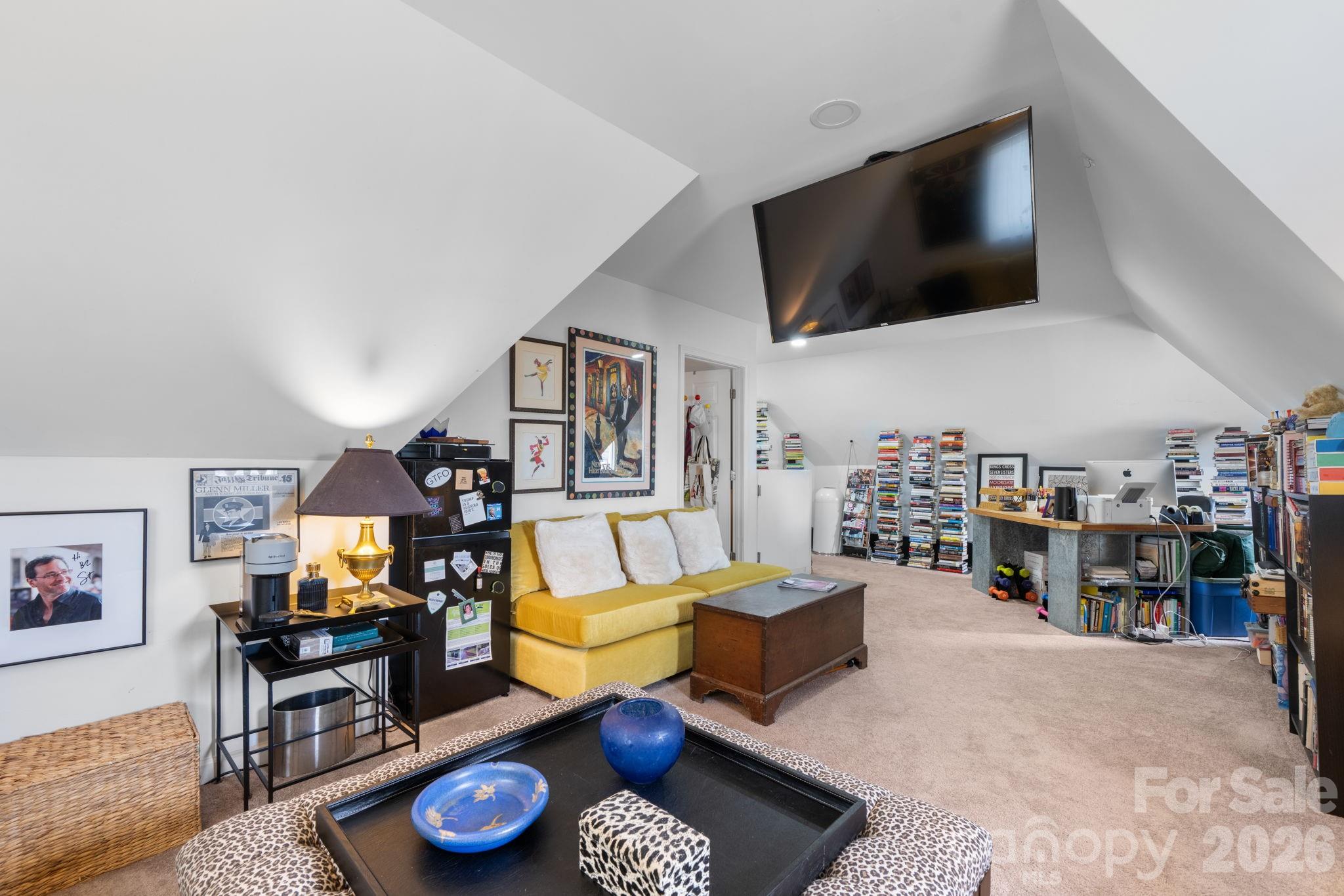 115 12th Street Southwest Hickory, NC 28602 - Photo 32 of 35 a living room with furniture and a flat screen tv