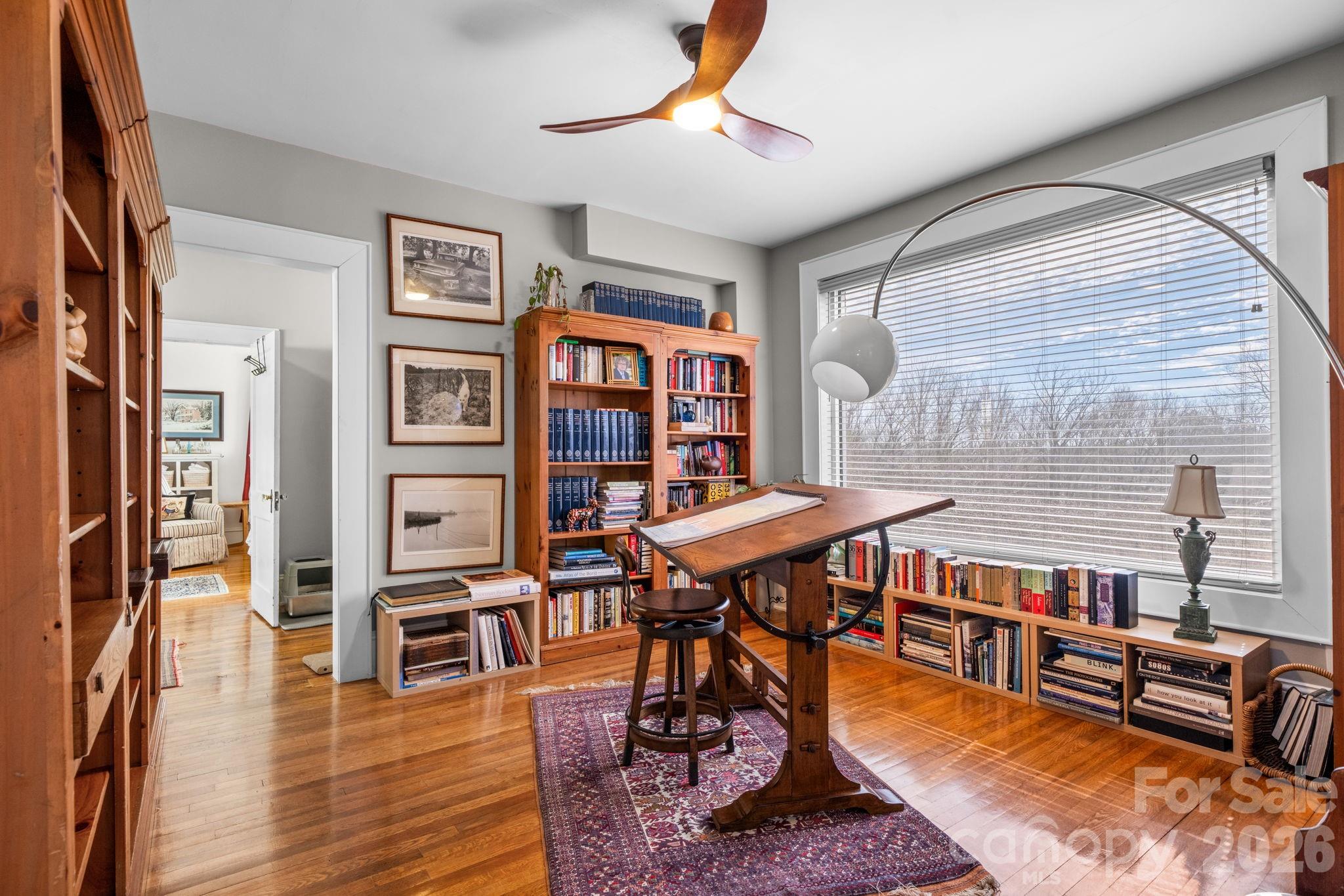 115 12th Street Southwest Hickory, NC 28602 - Photo 8 of 35 a balcony view with furniture and wooden floor